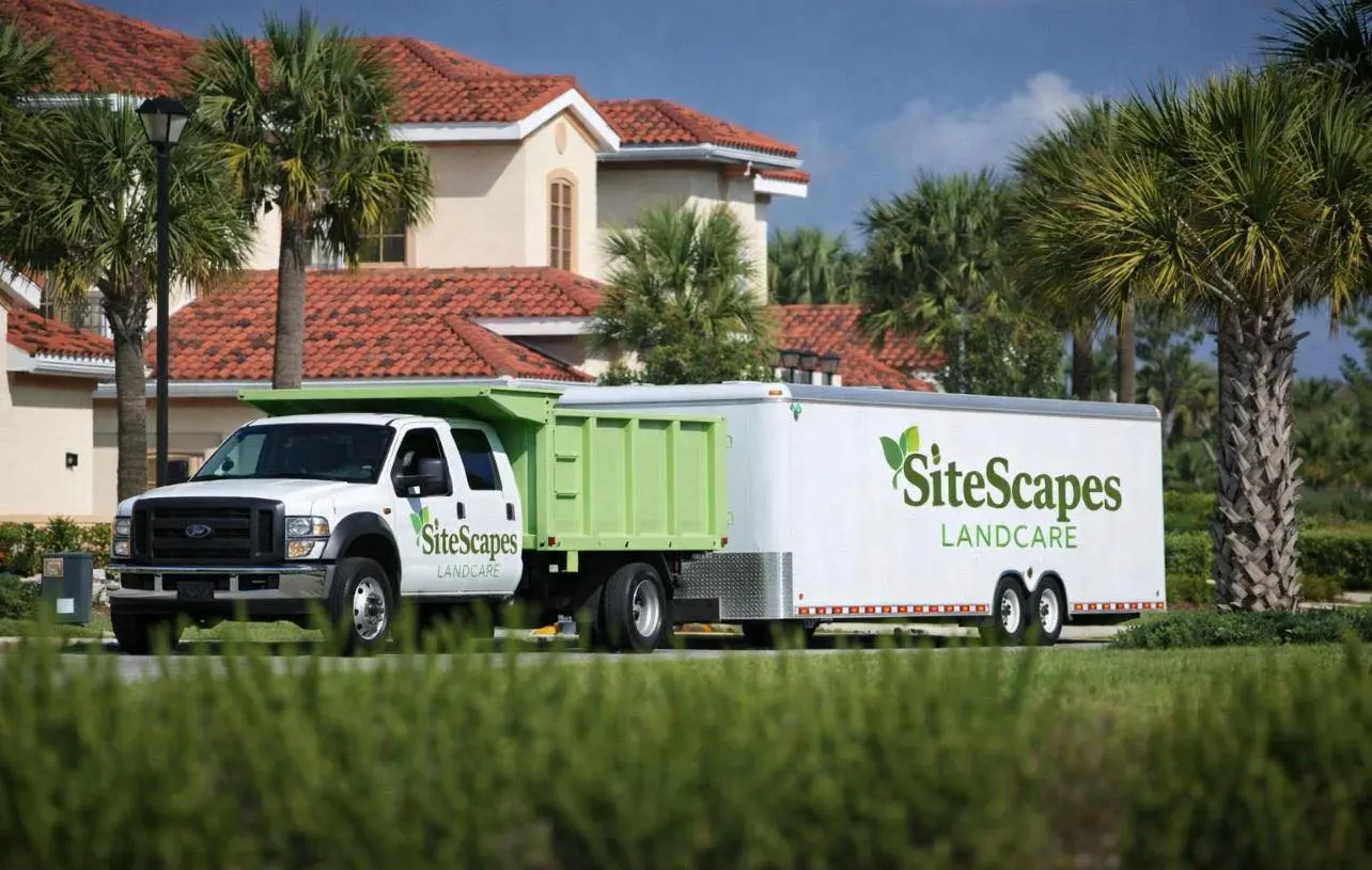 SiteScapes Landcare service truck on a Southwest Florida property